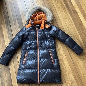 Lacoste Dark Puffer Jacket with Orange Details and removable fur hood